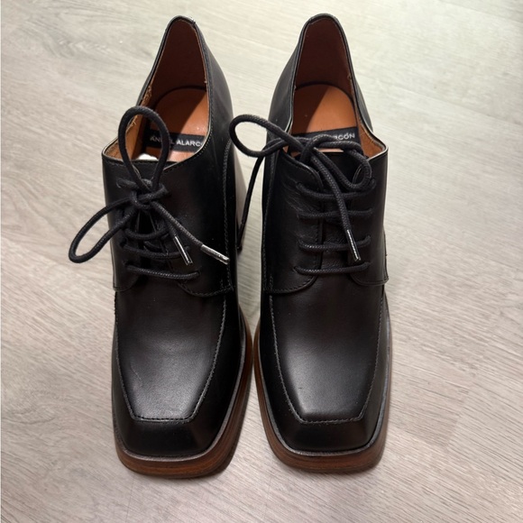 Elegant Black Leather Platform Heels - Picture 2 of 5